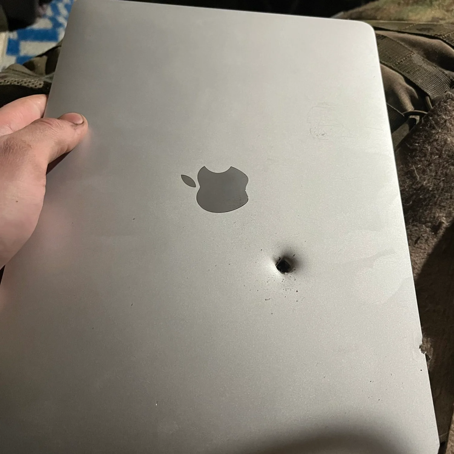 Apple MacBook Air reportedly stops artillery shell fragment for Ukrainian soldier, with damaged display still partially functional - NotebookCheck.net News
