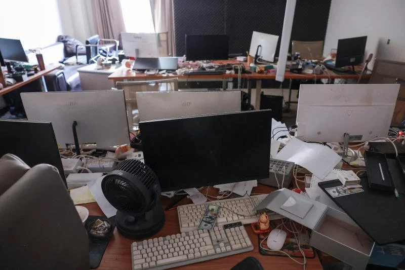 Computers inside a compound in O'Smach in Oddar Meanchey province, Cambodia, used for scam operations, at the Chong Chom-O'Smach border crossing, on Feb 2. The place was bombed and occupied by the Thai military in December following clashes between Thailand and Cambodia.(Photo: Reuters)