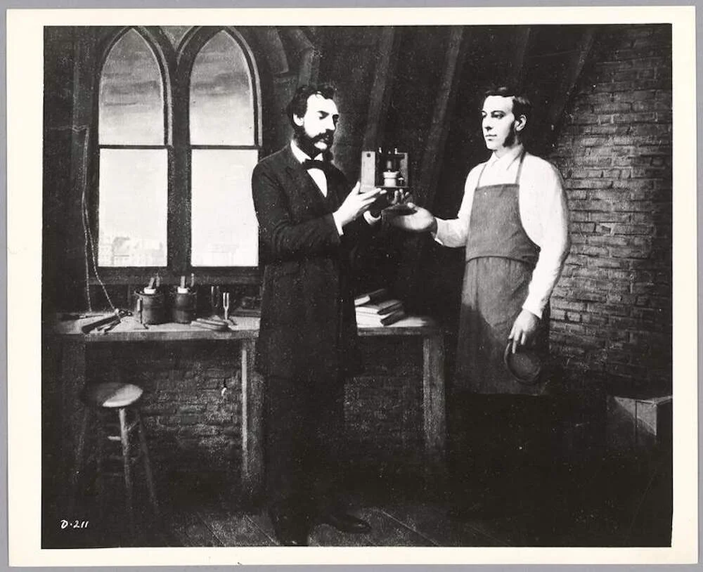 A 1875 sketch by an unknown artist of Alexander Graham Bell and Thomas Watson conducting experiments. (Courtesy MIT Museum)